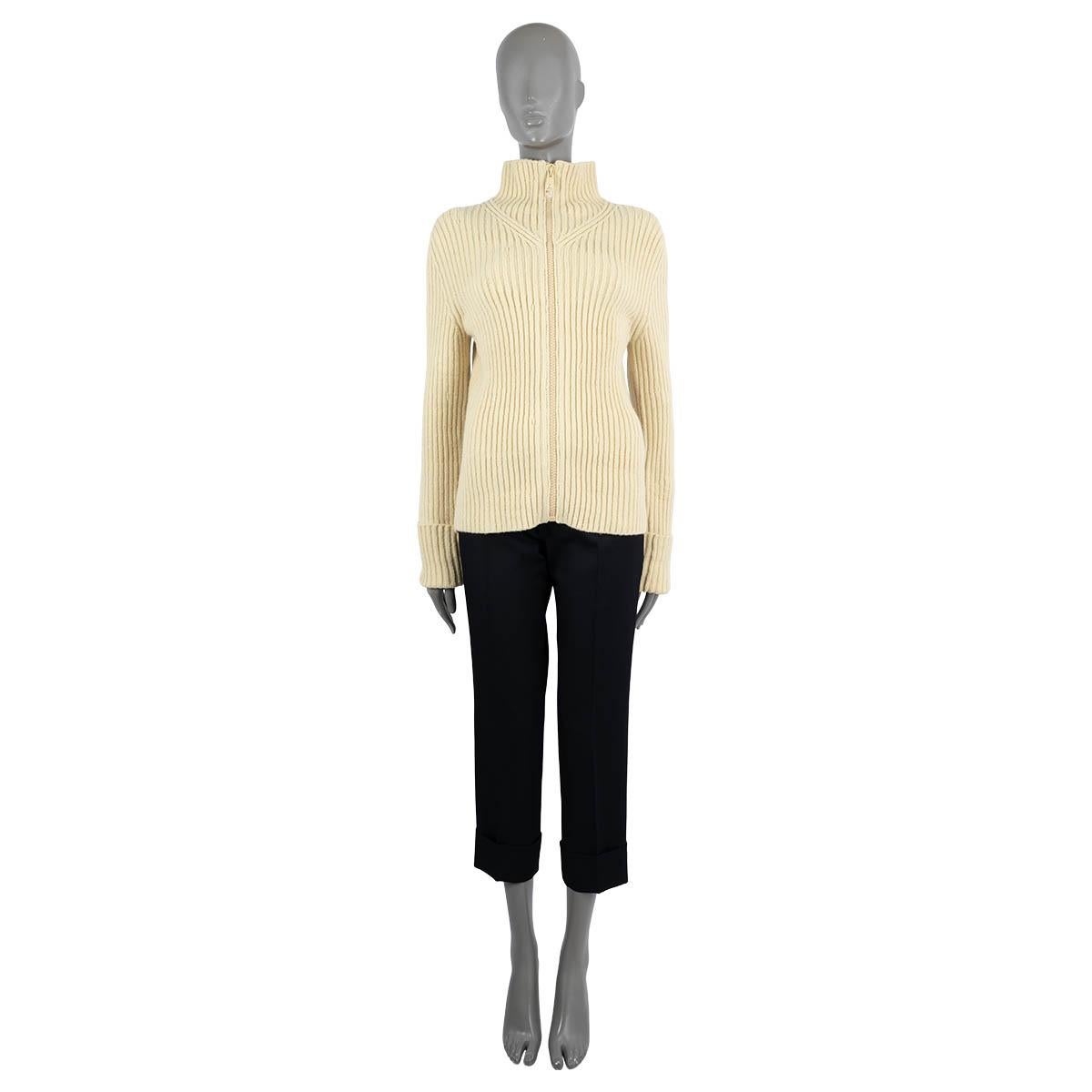 100% authentic Bottega Veneta zip-front cardigan in Butter (beige) rib-knit wool (92%), polyamide (7%) and elastane (1%). Features a high-neck, extra long sleeves and chunky knit.

2020 Fall/Winter

Measurements
Model	640084V07XO
Tag