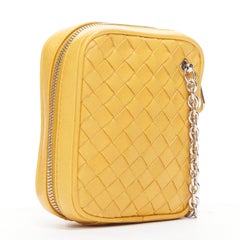 BOTTEGA VENETA butter yellow intrecciato woven silver chain wrist pouch bag