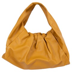 BOTTEGA VENETA Butterscotch brown leather MAXI POUCH Hobo Bag