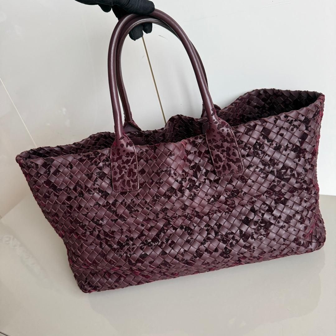 Bottega Veneta Cabat Large Intreccio Burgundy Leather and Velvet 40cm
 These are professional photos of the actual bag.
 Discover the sophisticated luxury of the Bottega Veneta Cabat Intreccio Leather Tote Bag. Revel in its stylish cult design,