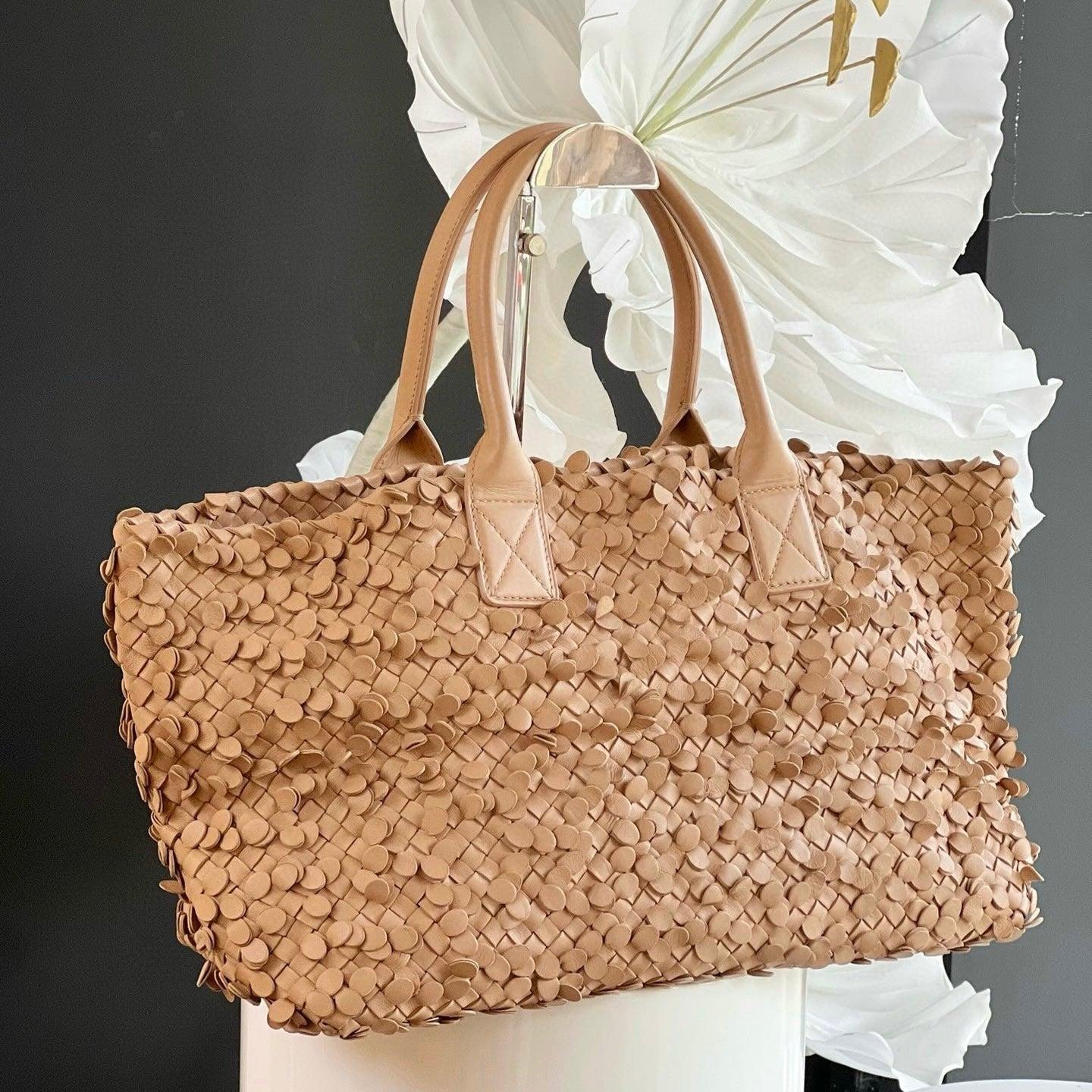Bottega Veneta Cabat Limited Tan Poussin Paillettes Tote Beige
 These are professional photos of the actual bag offered by Luxbags.
 Discover the sophisticated luxury of the Bottega Veneta Cabat Intreccio Leather Tote Bag. Revel in its stylish cult