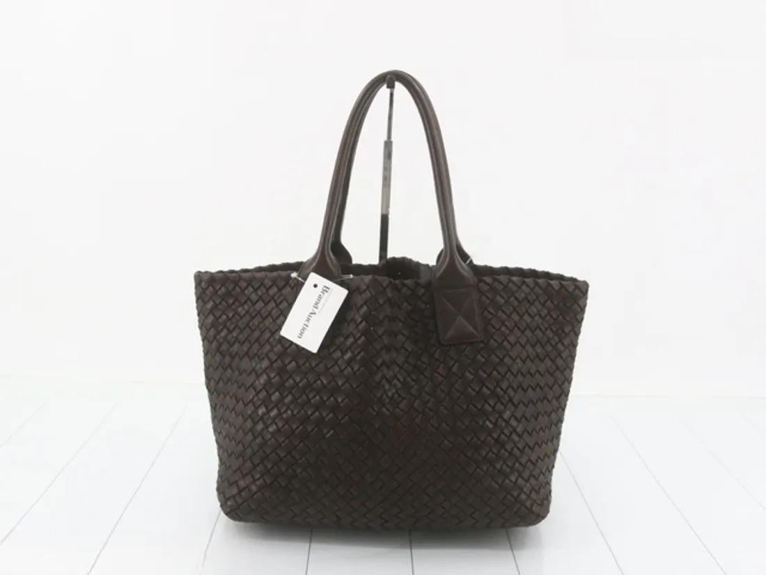 Bottega Veneta Cabat Small Intreccio Leather Tote Bag brown
 These are professional photos of the actual bag.
 Discover the sophisticated luxury of the Bottega Veneta Cabat Intreccio Leather Tote Bag. Revel in its stylish cult design, handcrafted in
