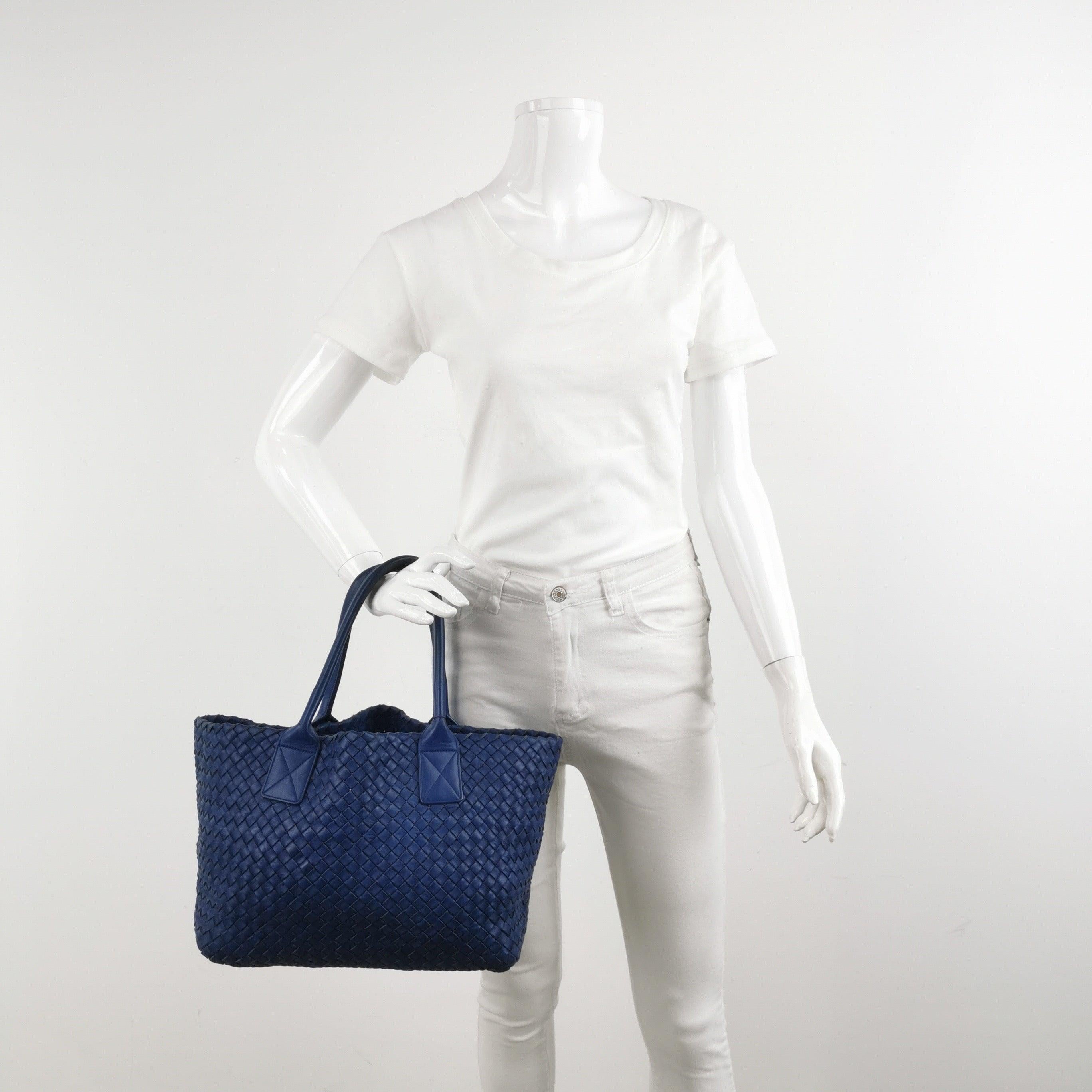 Bottega Veneta Cabat Small Intreccio Leather Tote Bag Navy Blue
 These are professional photos of the actual bag .
 Discover the sophisticated luxury of the Bottega Veneta Cabat Intreccio Leather Tote Bag. Revel in its stylish cult design,