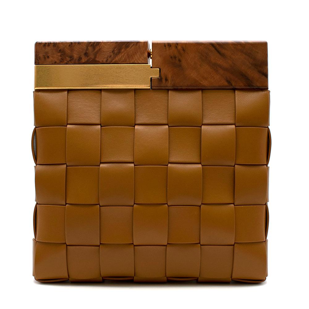 Bottega Veneta Camel BV Snap Bag

- Square shaped
- Clutch 
- Signature BV Intrecciato woven leather
- Tuja snap fastening
- Unlined 
- Gold and silver hardware

Materials:
90% Lambskin
10% Wood

Made in Italy

Measurements:
Height 26cm
Width