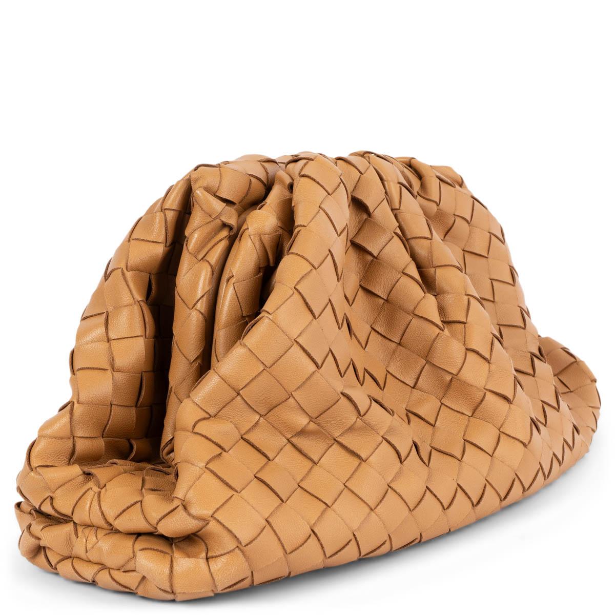 100% authentic Bottega Veneta Classic Pouch in camel Intrecciato woven calfskin. Opens with a magnetic frame closure and is lined in calfskin leather. Has been carried and is in excellent condition. Comes with dust bag. 

Measurements
Height	18cm