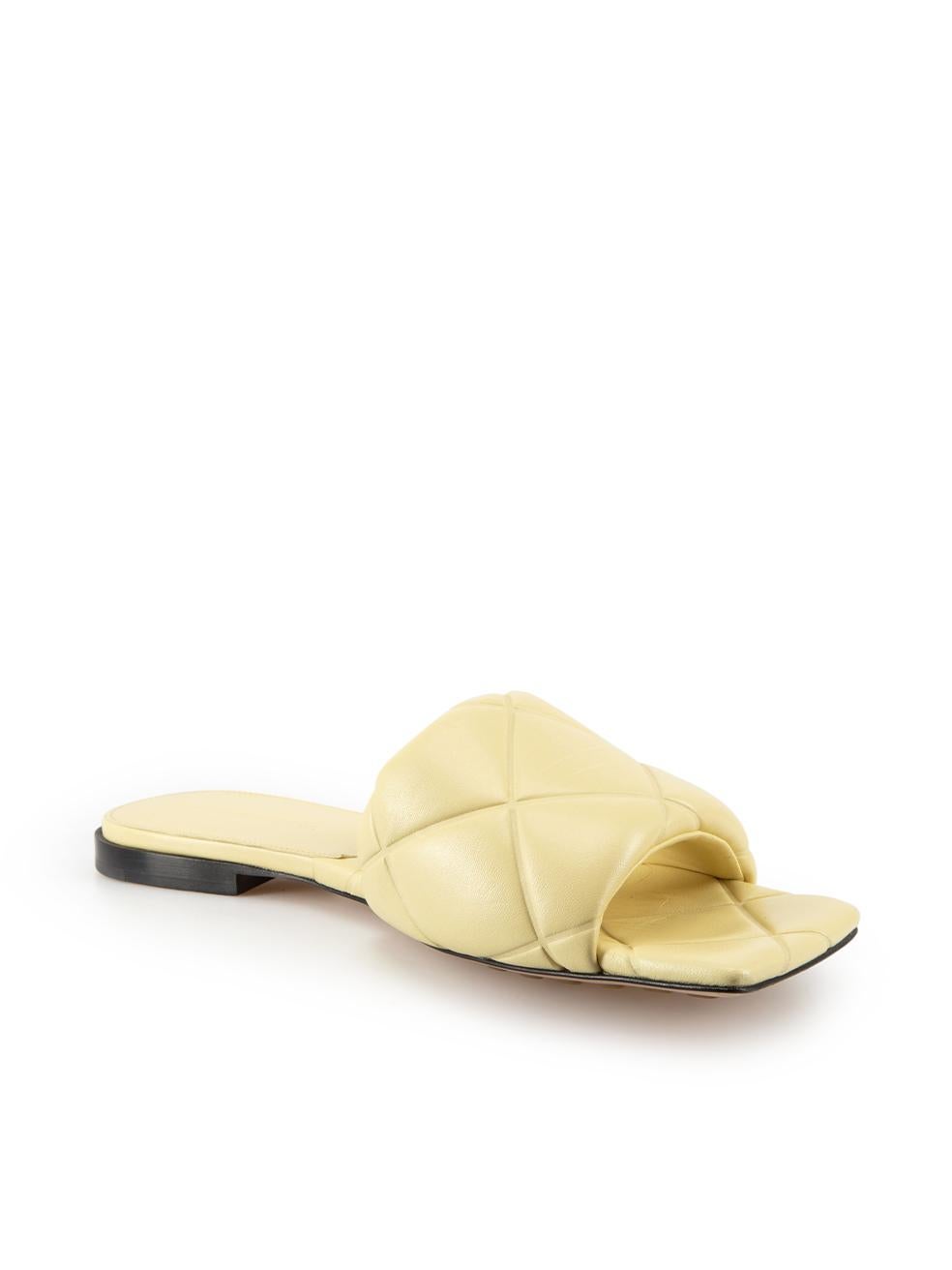 CONDITION is Very good. Hardly any visible wear to sandals is evident despite minimal creasing and light marking of outsole on this used Bottega Veneta designer resale item.



Details


Canary yellow

Leather

Slide sandals

Quilted and