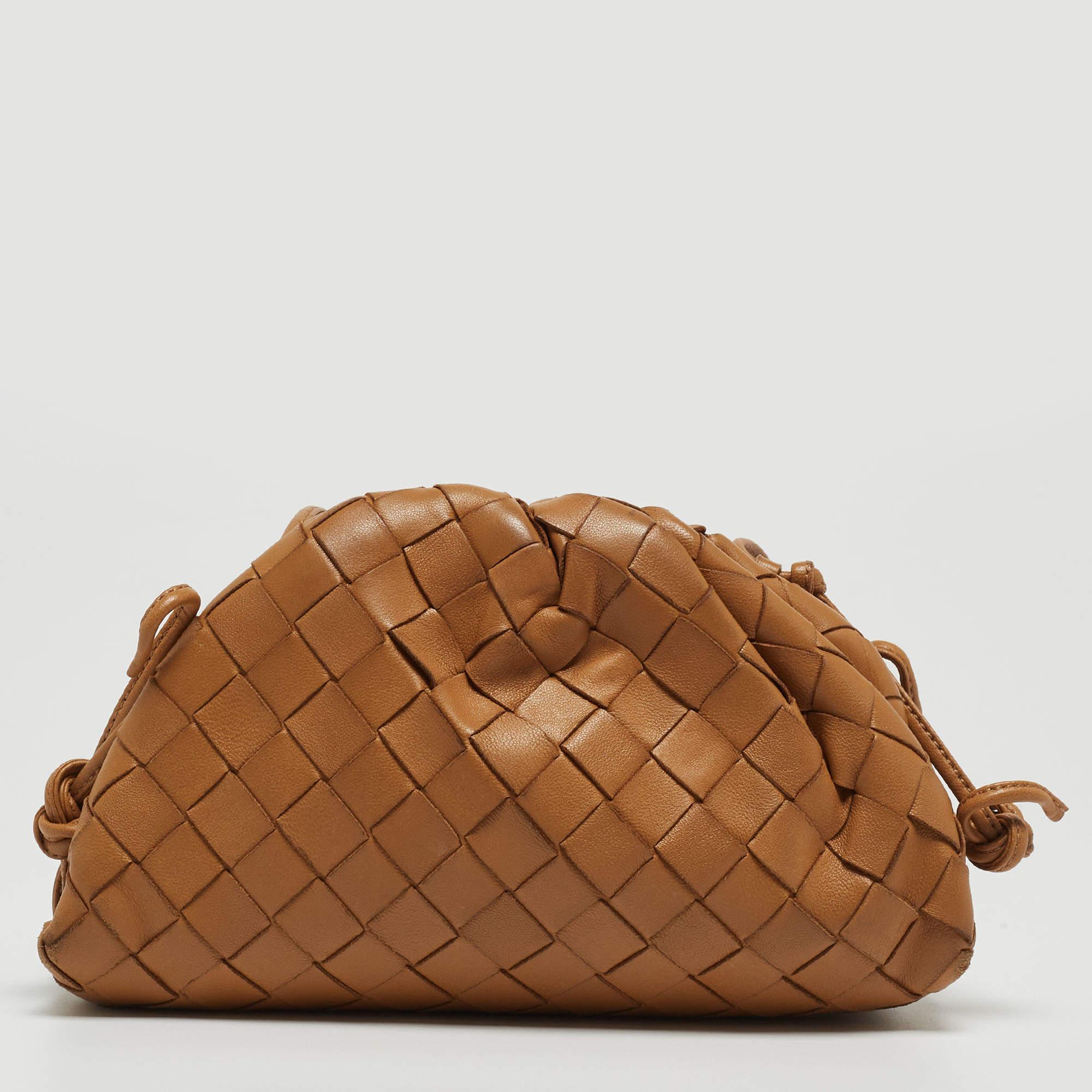 Elevate your style with this Bottega Veneta bag. Merging form and function, this exquisite accessory epitomizes sophistication, ensuring you stand out with elegance and practicality by your side.

Includes: Original Dustbag, Original Box, Info