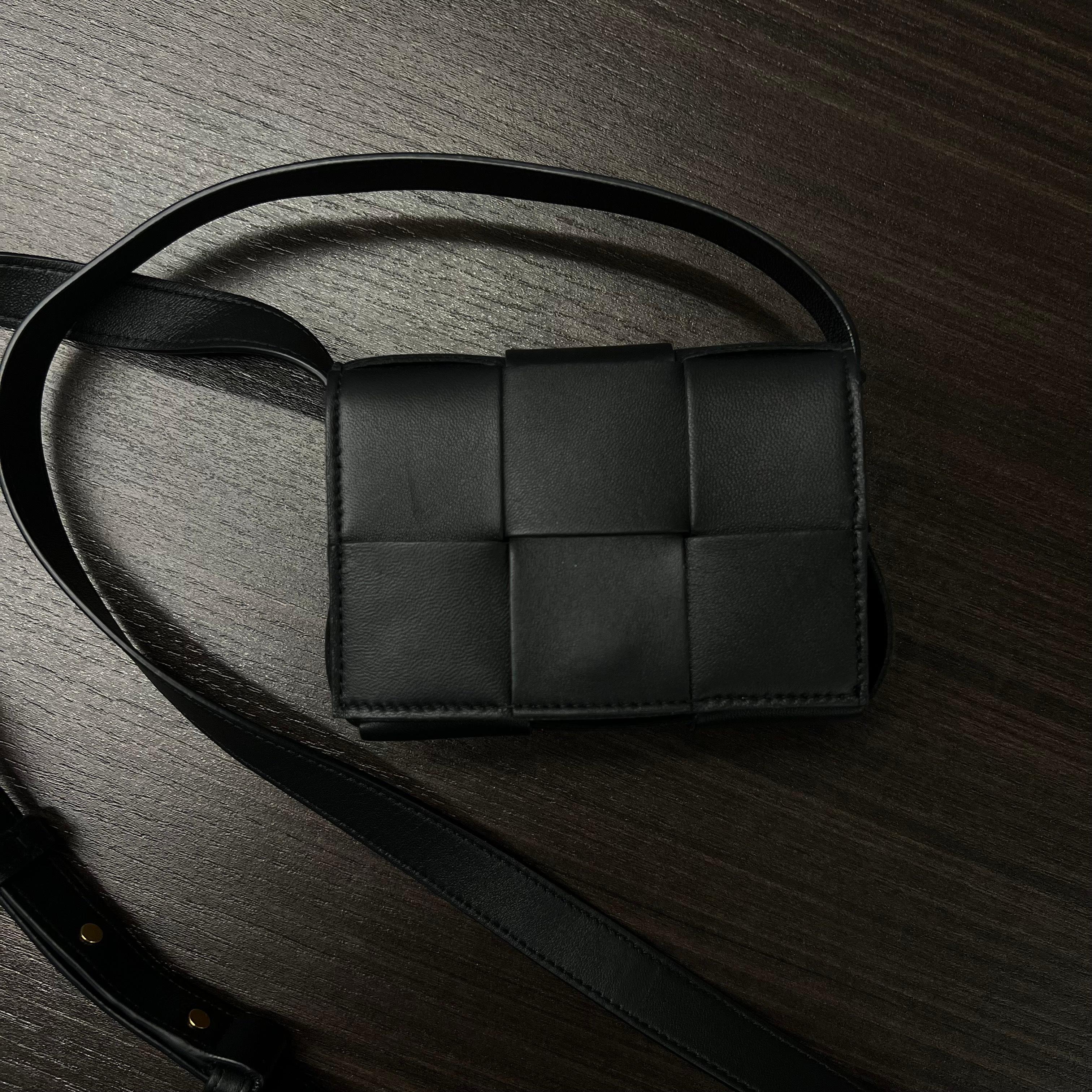 Bottega Veneta Cassette Intrecciato Black Leather Mini Cross Body Bag In Excellent Condition In New York, NY