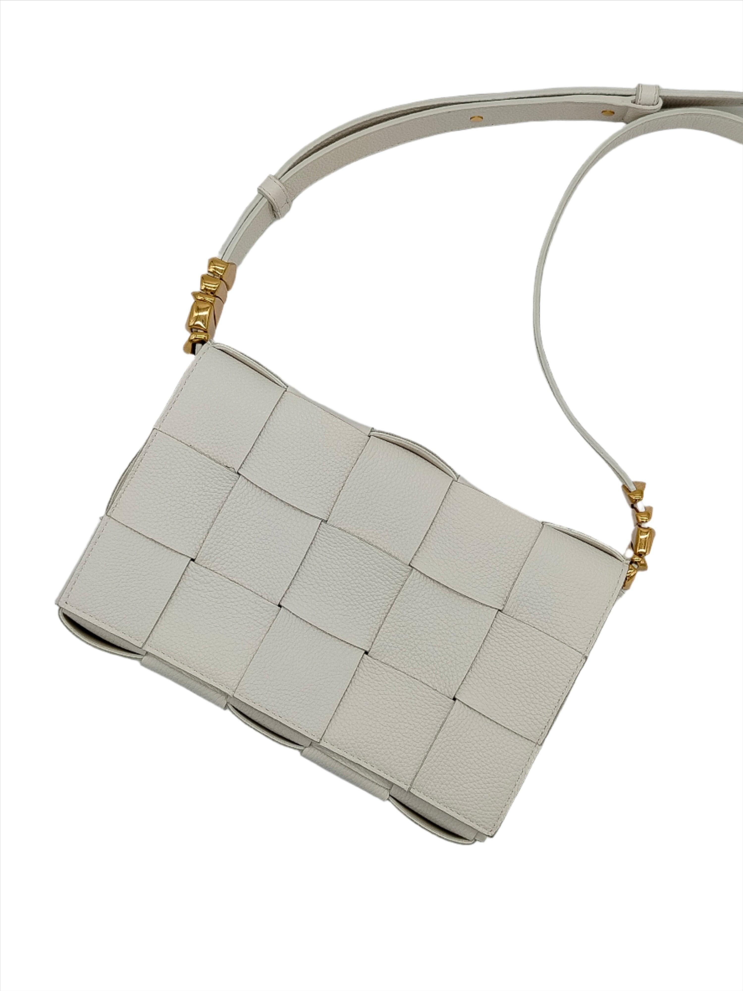 Cassette crossbody bag in Intreccio's signature crafted leather with metal adjustable shoulder strap.

Height:15;Width:23;Depth:5;Handle Drop:52 Material: Leather