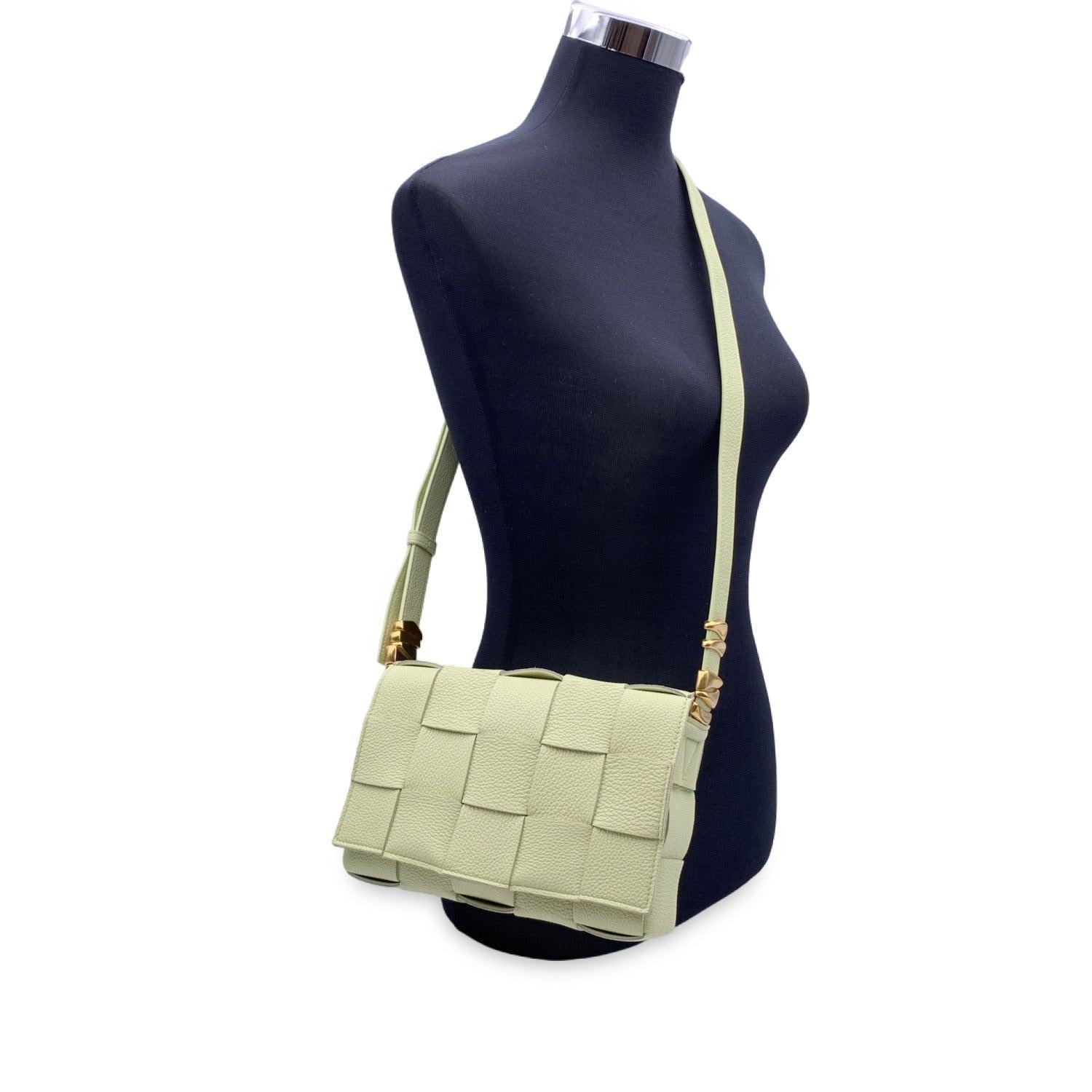 This beautiful Bag will come with a Certificate of Authenticity provided by Entrupy. The certificate will be provided at no further cost Bottega Veneta Intreccio Saint Germain 'Cassette' Bag. Light yellow Intrecciato-woven leather (official color is