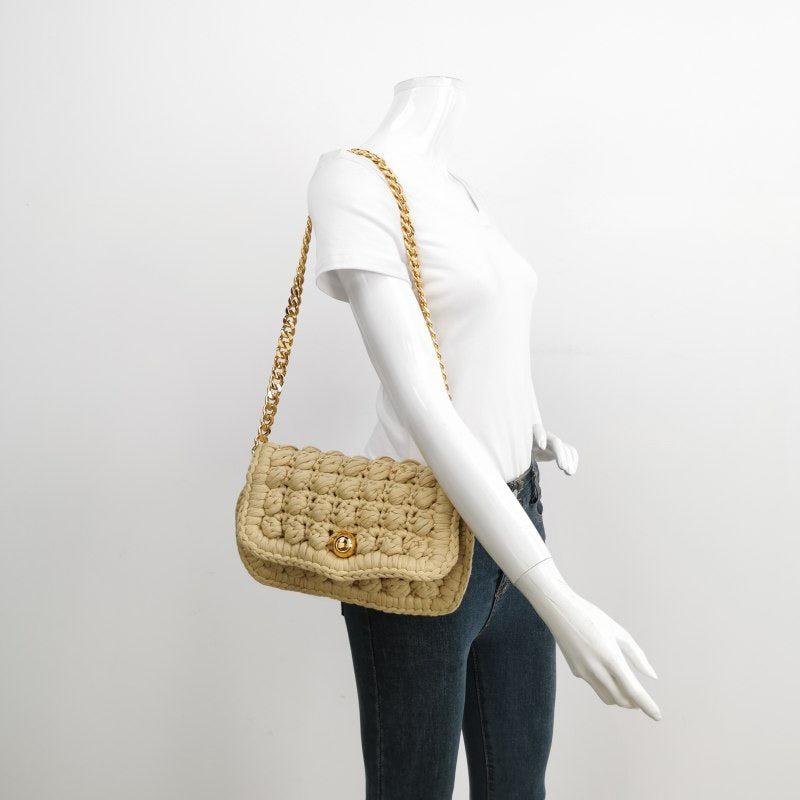 Bottega Veneta Classic Jersey Hand-crocheted Shoulder bag in Cane sugar with Gold Hardware
These are professional photos of the actual bag.
  Season 2024
  CONDITION: NEAR NEW
  DETAILS
  
  
  
  Jersey hand-crocheted shoulder bag
  Single