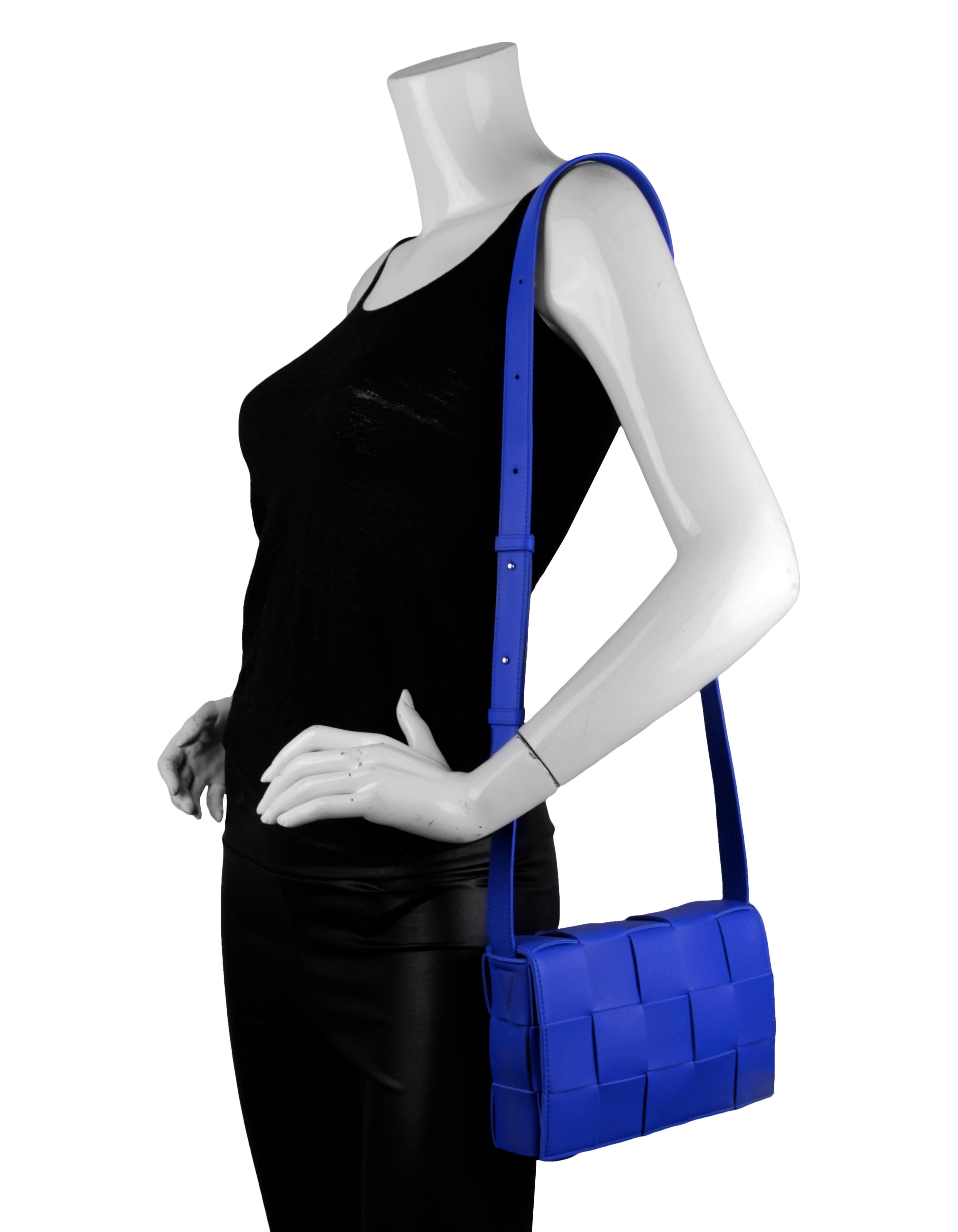 Bottega Veneta Cobalt Blue Lambskin Leather Maxi Intrecciato Cassette Crossbody Bag

Made In: Italy
Color: Cobalt blue
Hardware: Silvertone
Materials: Lambskin leather and metal
Lining: Bonded lambskin leather
Closure/Opening: Flap top with