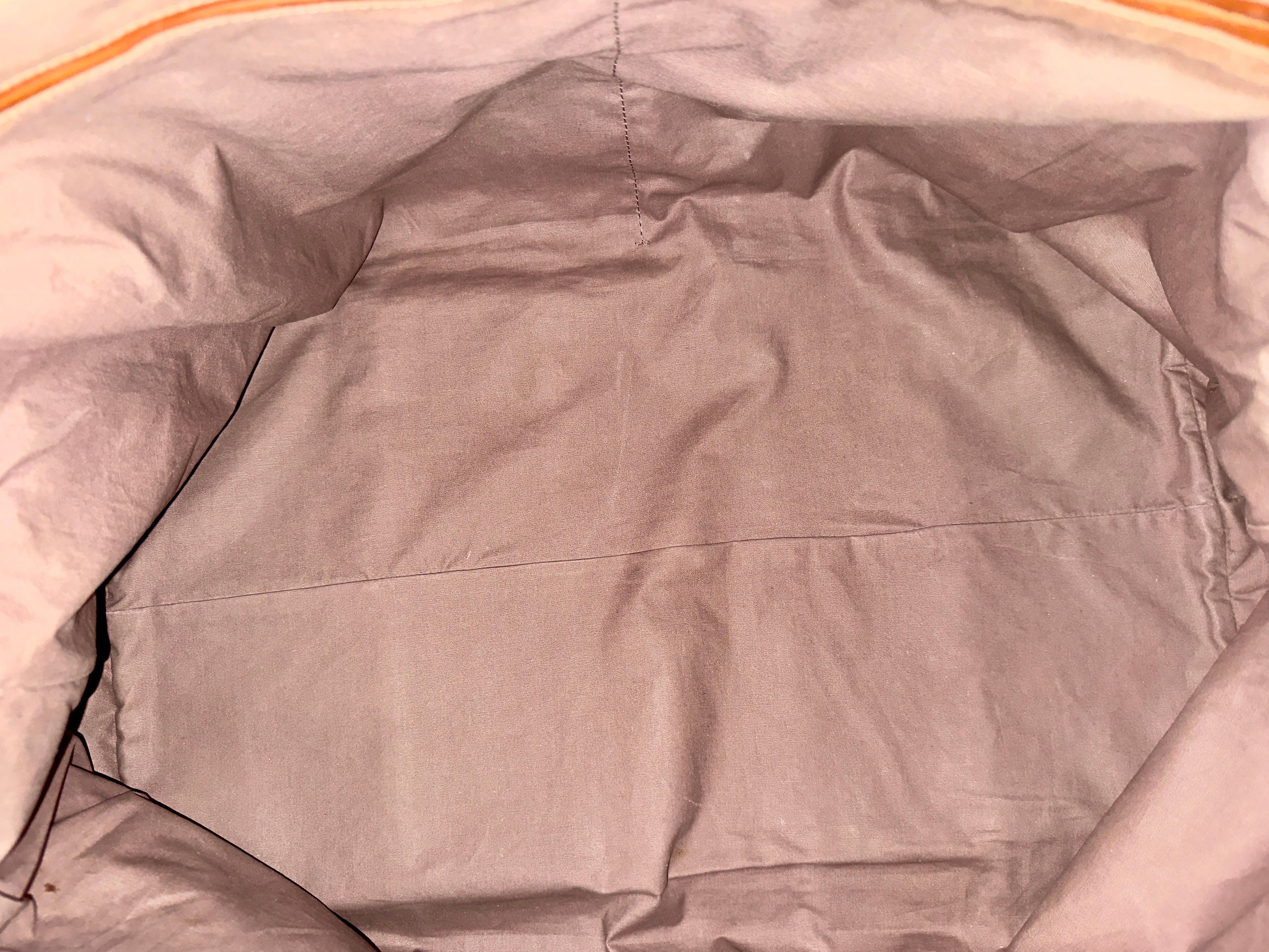 BOTTEGA VENETA Bolso de viaje Weekender de piel antigua tejida Intrecciato coñac en venta 9
