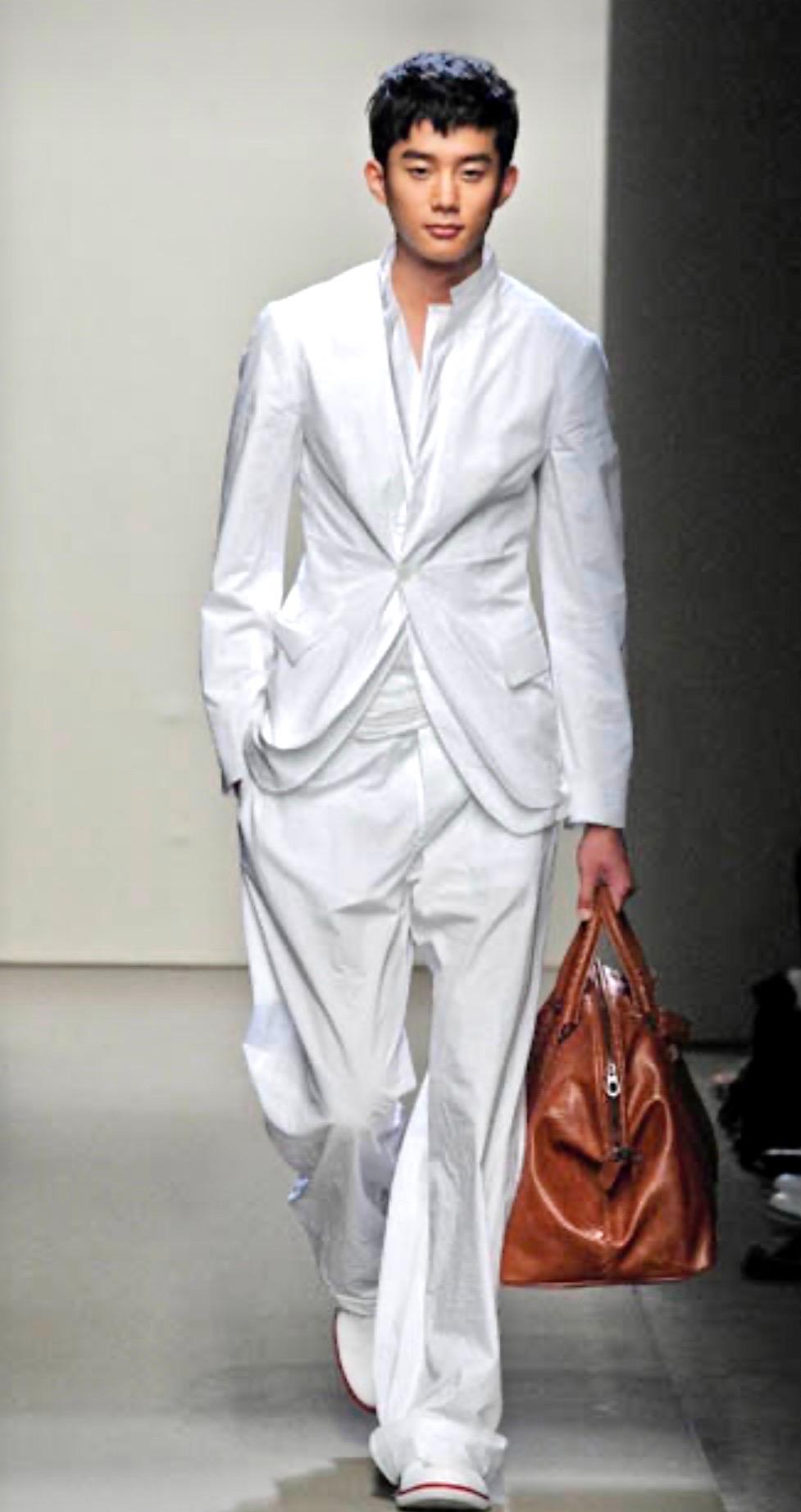 BOTTEGA VENETA Bolso de viaje Weekender de piel antigua tejida Intrecciato coñac en venta 10