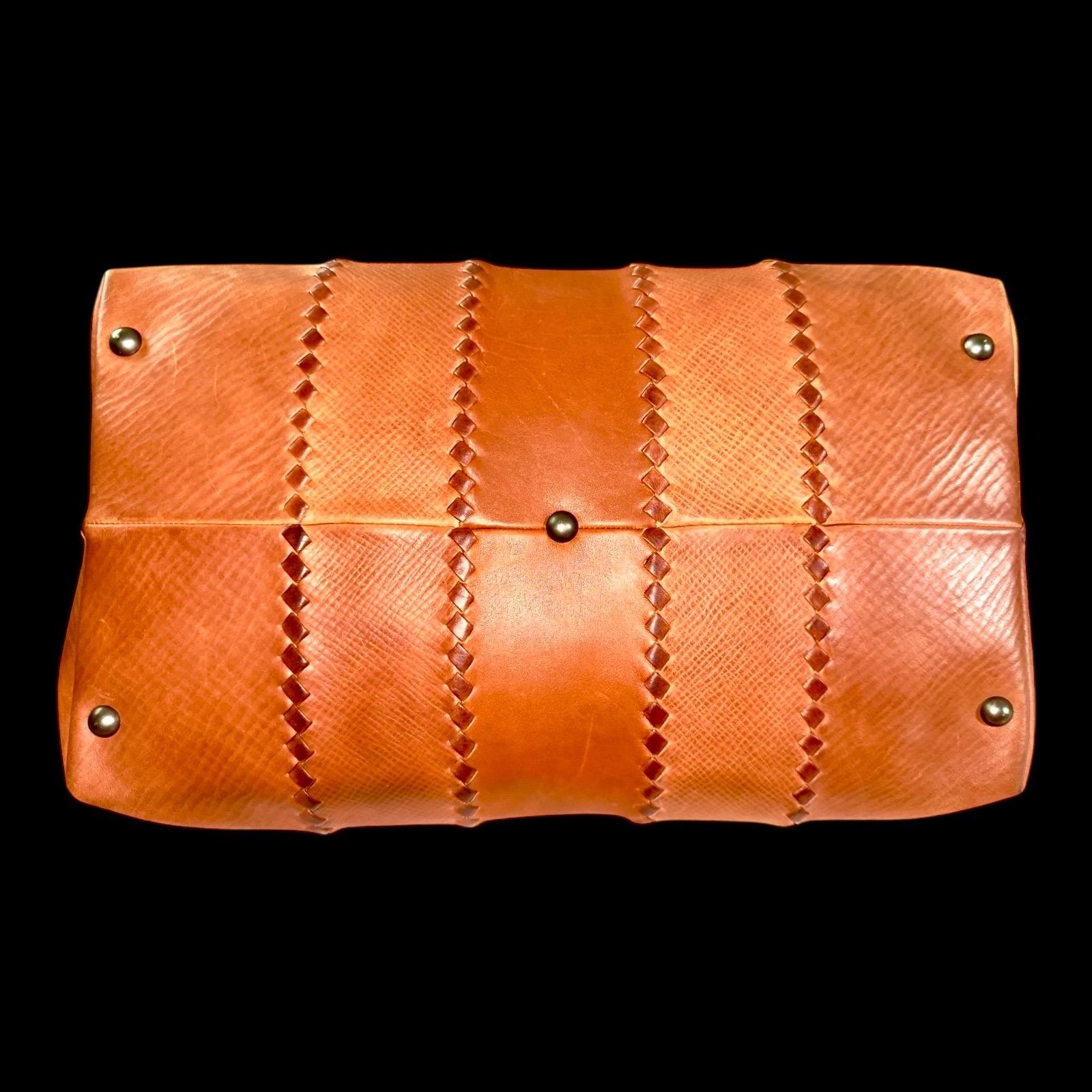 Femenino o masculino BOTTEGA VENETA Bolso de viaje Weekender de piel antigua tejida Intrecciato coñac en venta