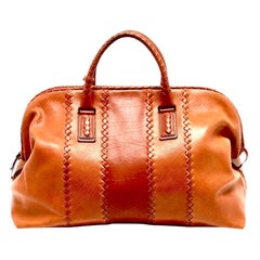 BOTTEGA VENETA Bolso de viaje Weekender de piel antigua tejida Intrecciato coñac