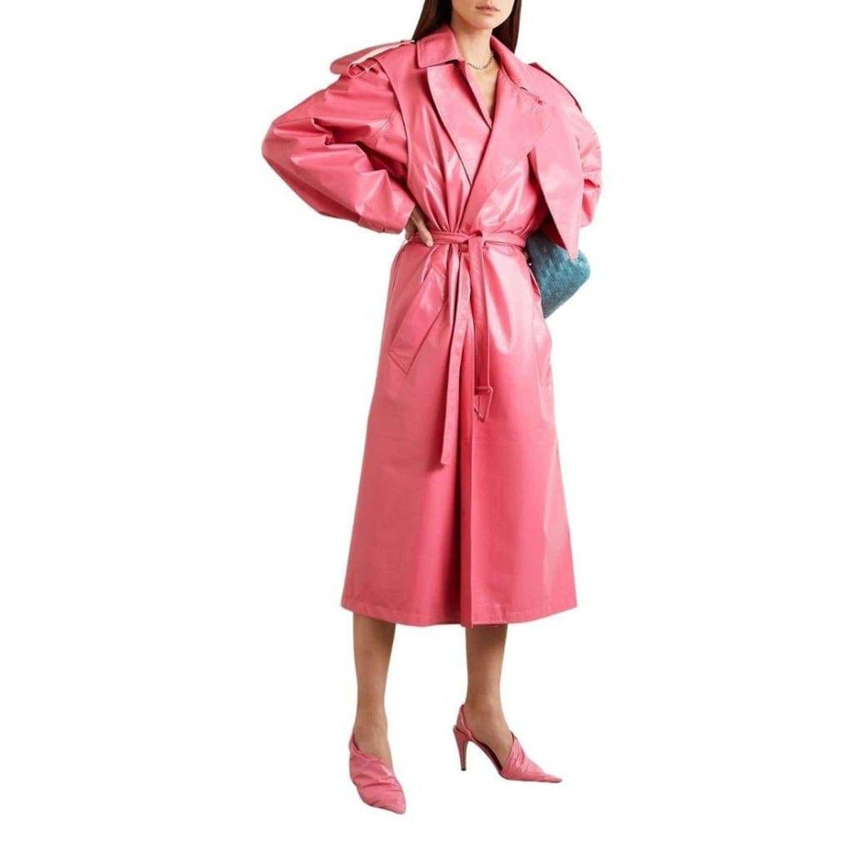 This trench coat is cut from crinkled glossed-leather in a vibrant 'Candy' pink hue and traced with strategically placed snaps - they'll allow you to transform it into a cropped jacket or sleeveless vest, depending on your mood. The triangular