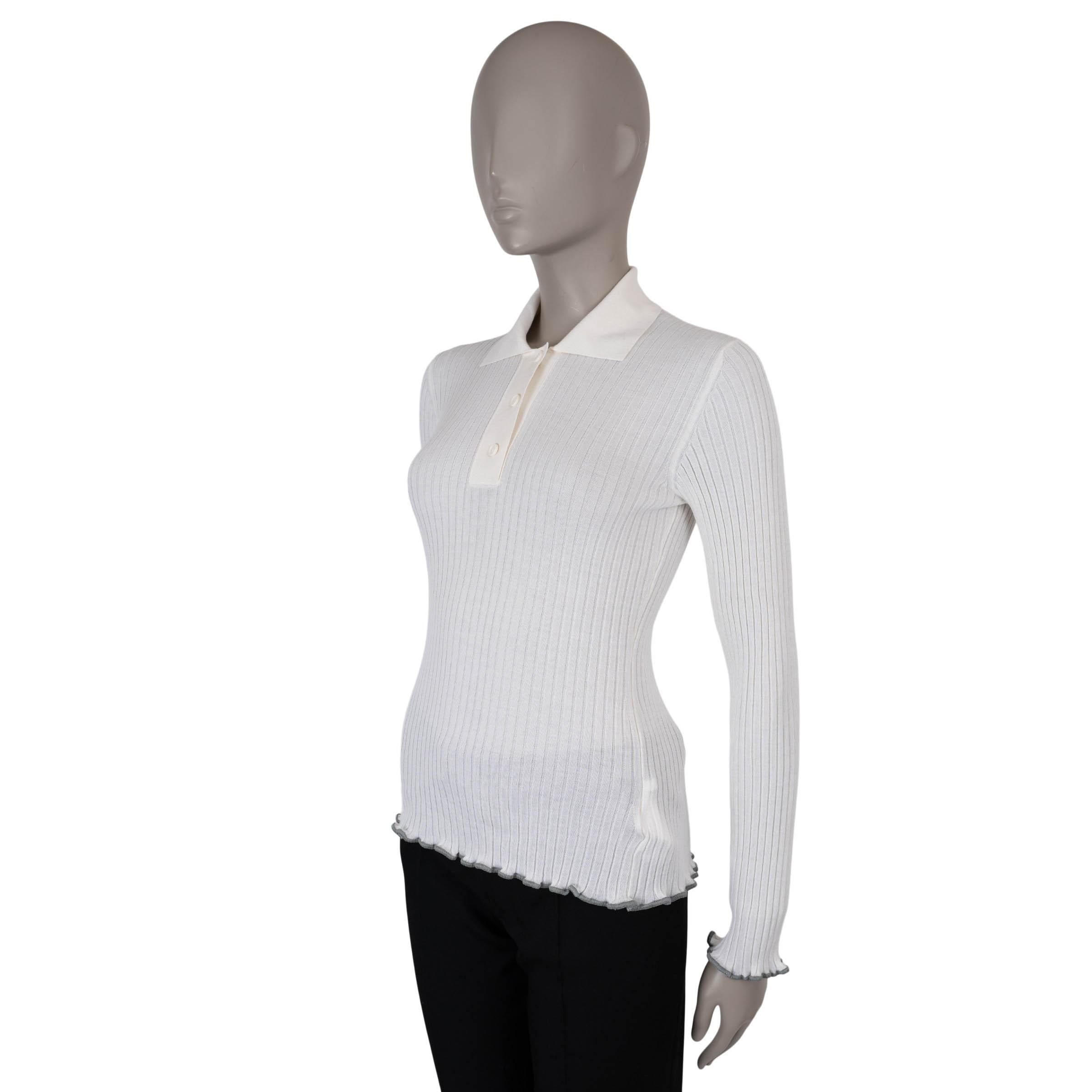 This 100% authentic Bottega Veneta polo sweater in cream rib-knit cashmere (70%) and silk (30%) showcases a modern yet feminine design. Featuring contrasting grey trims, it is tailored in a long-cut bodycon silhouette with extra-long sleeves, a