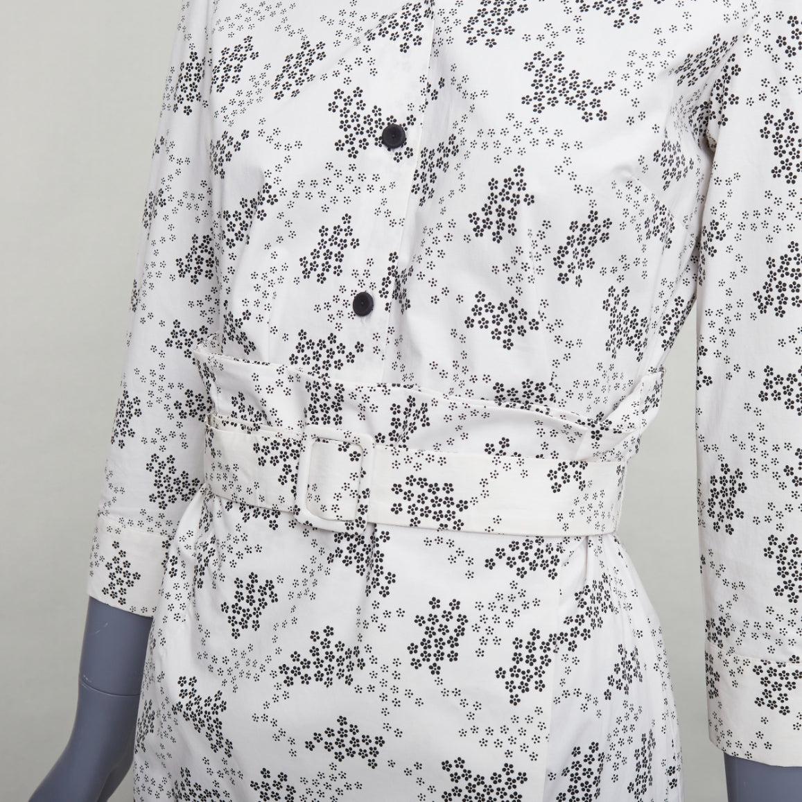 BOTTEGA VENETA cream cotton floral print wrap belted shirt dress IT38 XS
Reference: LNKO/A02556
Brand: Bottega Veneta
Designer: Tomas Maier
Material: Cotton, Blend
Color: Cream, Black
Pattern: Floral
Closure: Button
Made in: