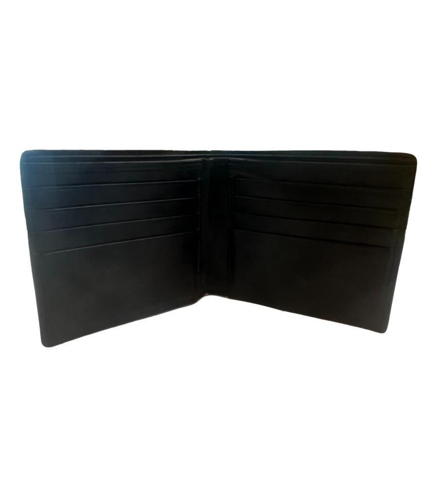 Bottega Veneta Crocodile Skin Wallet

Black shiny skin wallet.

Size - One Size

Condition - Good (Showing some signs of wear)

Composition - Crocodile Skin 

Comes With - Wallet Only