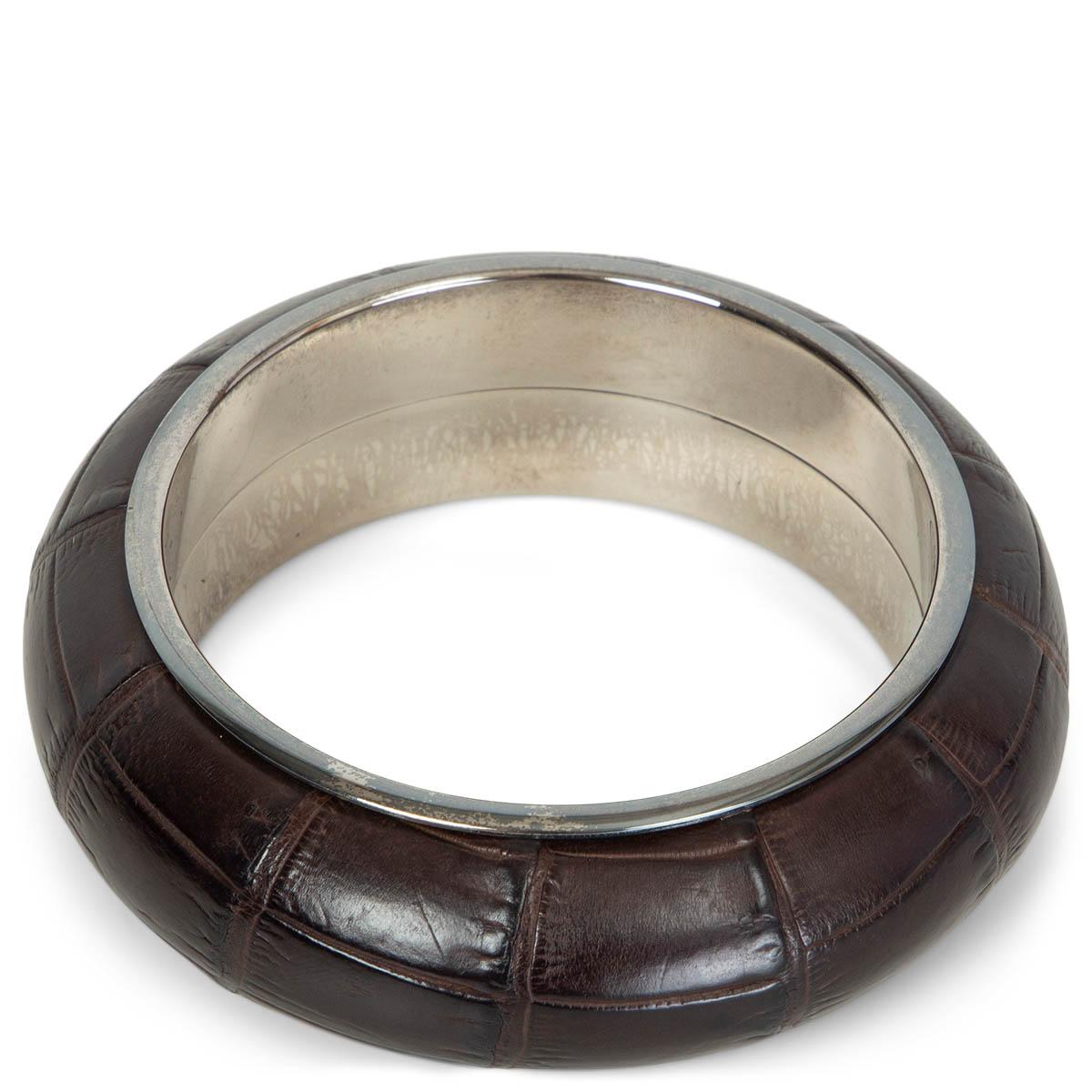 100% authentic Bottega Veneta bracelet in espresso brown crocodile and sterling silver. Has been worn and is in excellent condition.

Measurements
Width	2.5cm (1in)
Circumference	19cm (7.4in)

All our listings include only the listed item unless