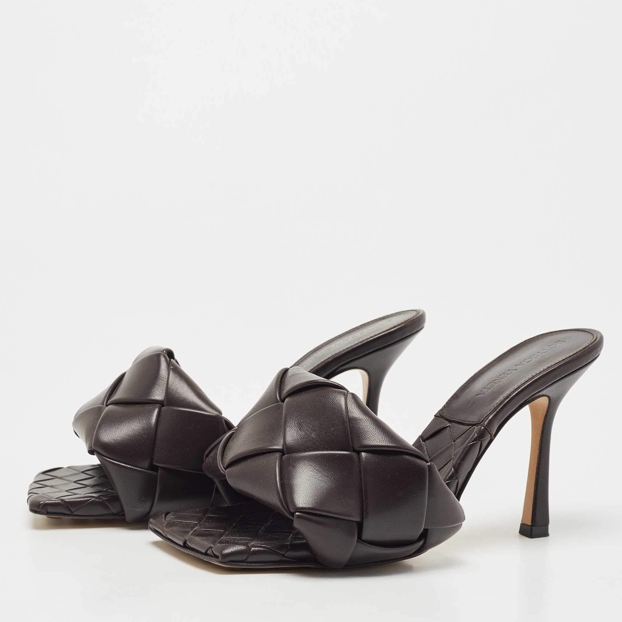 One of the most hot-selling designs, the Bottega Veneta Lido sandals adorn the feet of top celebrities and influencers. These beauties have been crafted from Bottega Veneta then set on tall heels. Style these sandals with pantsuits on days you want
