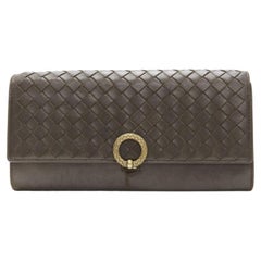 BOTTEGA VENETA dark brown Intrecciato weave gold ring long wallet
