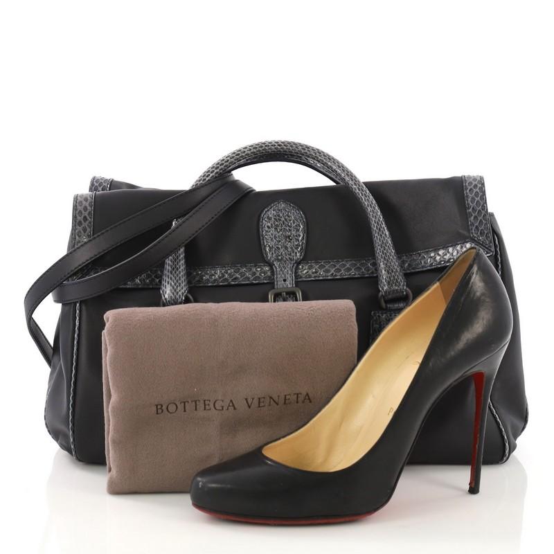 This Bottega Veneta Double Sided Buckle Top Handle Bag Leather with Python Detail Large, crafted in navy leather, features genuine purple python handles and trim, and matte gunmetal-tone hardware. Its double sided buckle closure opens to a taupe