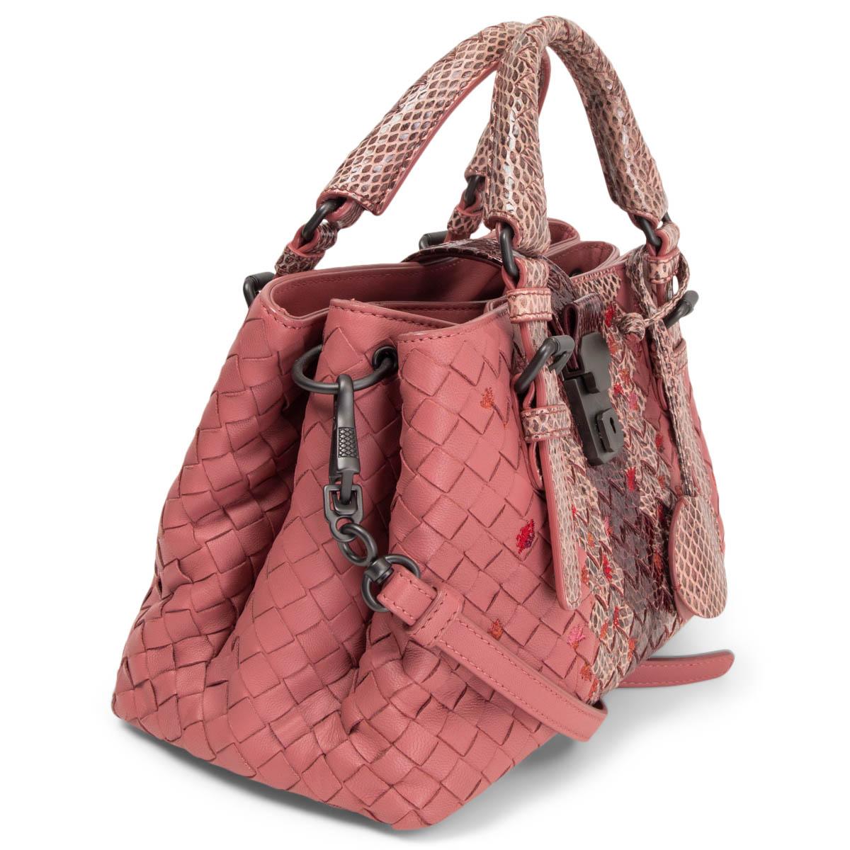 100% authentic Bottega Veneta 2017 Roma Small Bag in framboise Intreccito nappa leather and ayers (snakeskin) embroidered with small pink, orange and red flowers. Opens with a push-lock and is divided in three compartments, lined in taupe suede with