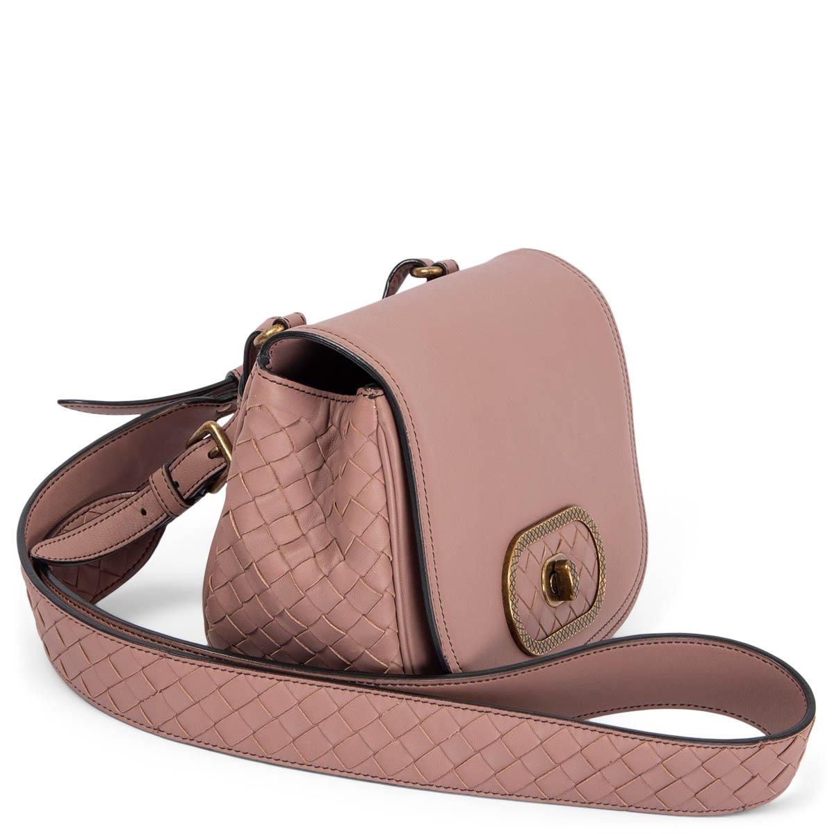100% authentic Bottega Veneta Intrecciato Luna shoulder bag in dusty pink nappa leather featuring antique gold-tone harware. Opens with a flap and turn-lock to a taupe microfibre lined interior with one open pocket under the flap. Has been carried