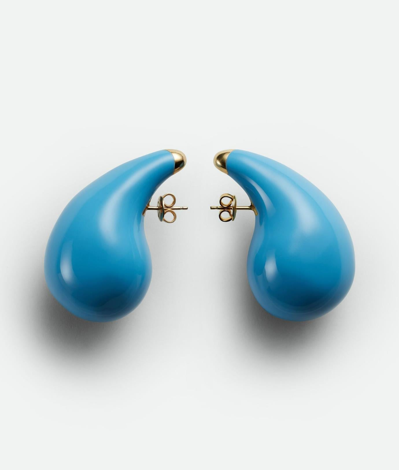 Bottega Veneta enamel and sterling silver earrings. Blue and gold. Butterfly fastening at back. Comes with dustbag and box. Length: 2.1 in. Width: 1.1 in. New with box
