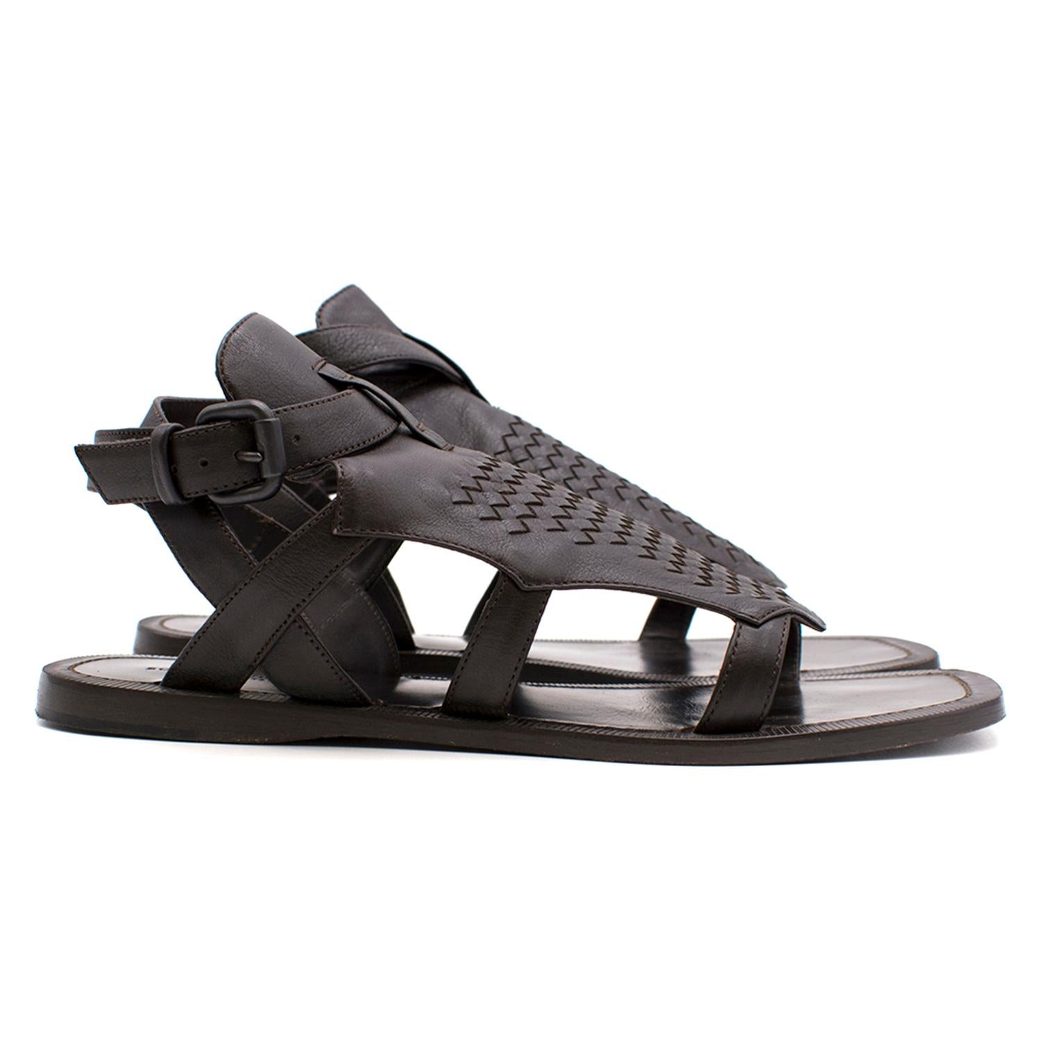 Bottega Veneta woven leather gladiator sandal in espresso with signature woven detail and wraparound buckled ankle strap.

Fabrics: Leather.

Please note, these items are pre-owned and may show signs of being stored even when unworn and unused. This