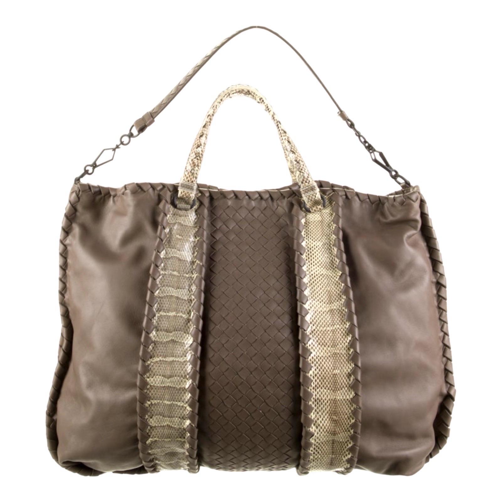 A BOTTEGA VENETA signature piece that will last you for many years

Exotic snakeskin embellishes this Bottega Veneta tote, offering an on-trend upgrade to the house's conventionally clean, intrecciato woven leather construction.

Bottega Veneta's