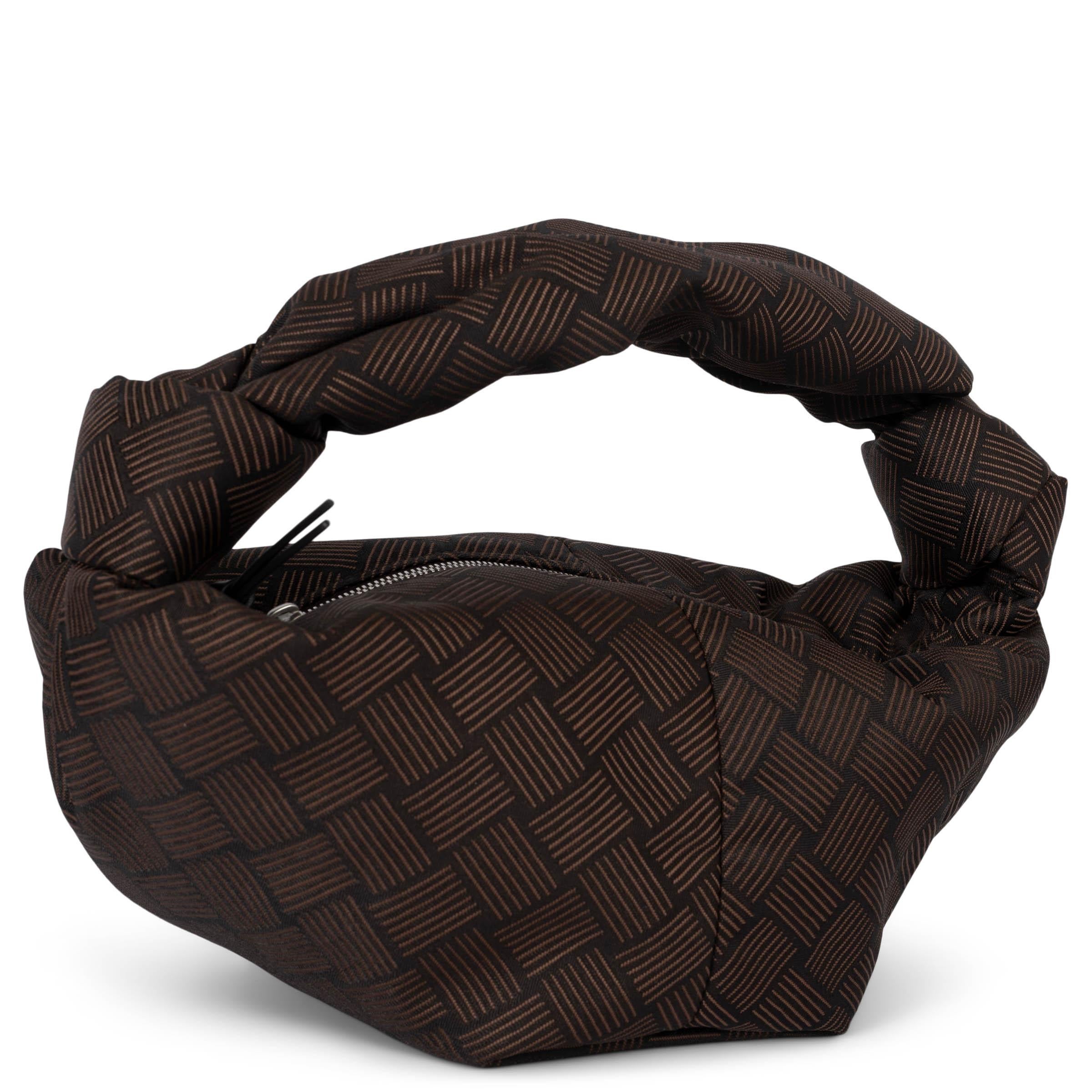 This 100% authentic Bottega Veneta Jodie Mini hobo bag in Fondant brown jacquard canvas showcases the iconic Intrecciato pattern, giving it a refined, textured look. It features a stylish knotted handle and closes securely with a zipper on top. The
