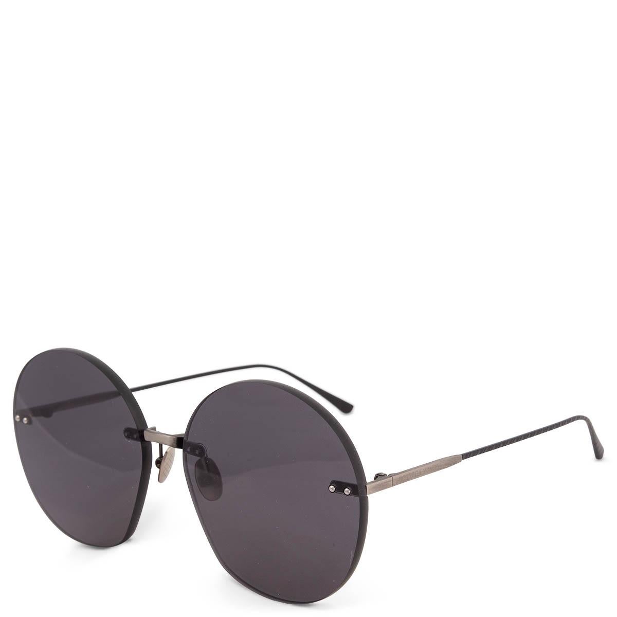 100% authentic Bottega Veneta BV0178S round shaped sunglasses in grey acetate with black lenses.  Have been worn and are in excellent condition. Without a case. 

Measurements
Model	Bottega Veneta BV0178S Sunglasses Grey
Width	14cm