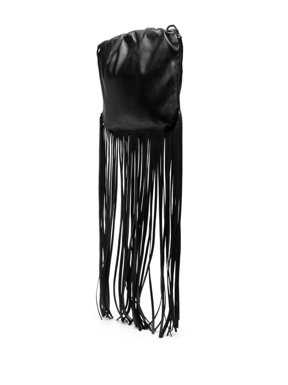 * Black
* Calf leather
* Smoothing finish
* Fringe detailing
* Drawstring fastening
* Single shoulder strap
* Very Good Condition: Minor scratches can be seen at the bottom of the main bag. 

Please note that most of the items we carry have been
