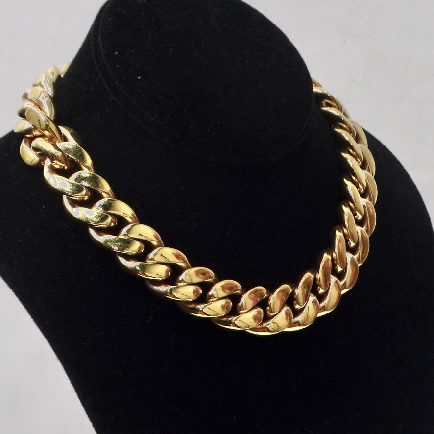 Do not miss out on this timeless and regal Bottega Veneta gold tone chain necklace! The perfect gold chain necklace is compromised of 925 sterling silver. Super thick and luxurious chain features a clasp fastening with logo engravings. Prepare to