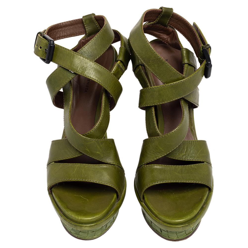 We can't stop gushing over this amazing pair of sandals from Bottega Veneta. They have been crafted from leather and styled in a strappy layout. The sandals come with ankle fastenings, and Intrecciato detailing on the wedges.

