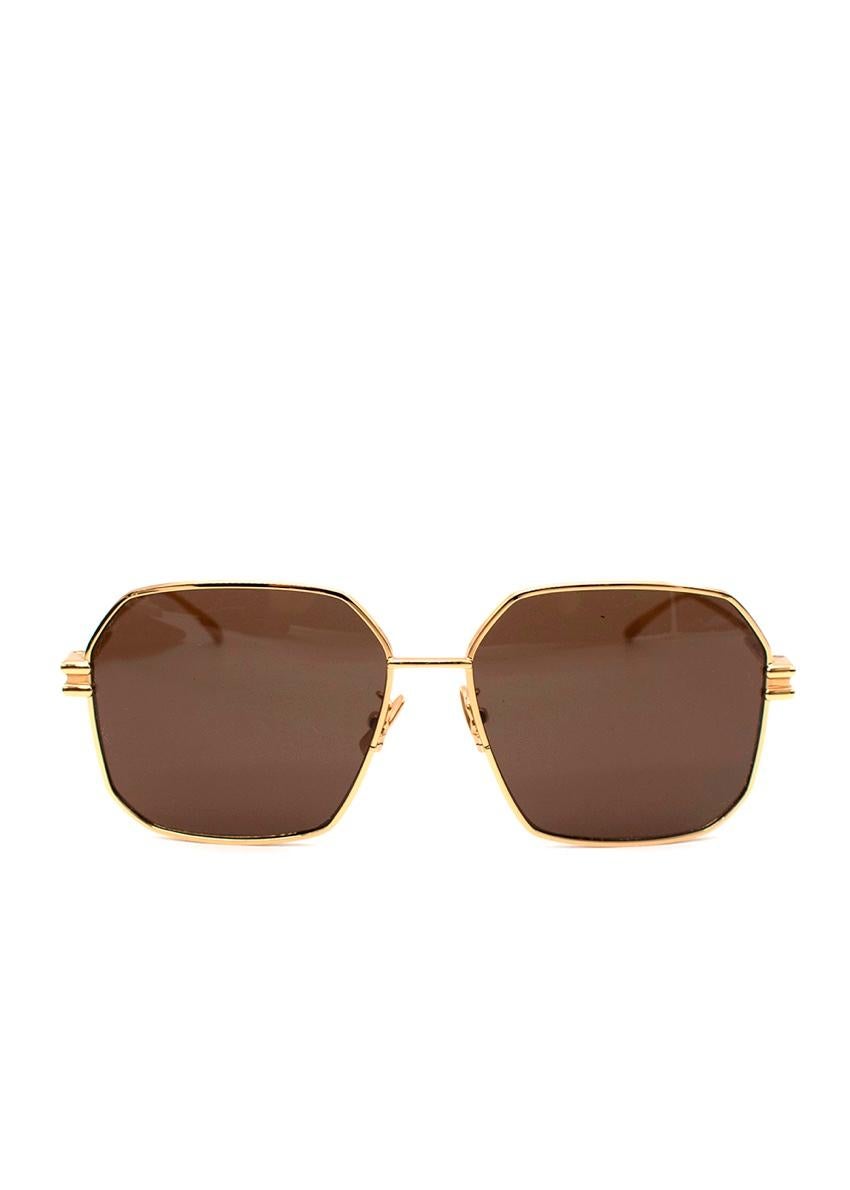 Bottega Veneta Hexagon-Frame Gold-Tone Sunglasses
 
 
 
 -Designed with hexagon frames,
 
 -Gold-tone metal and fitted with brown UV-protective lenses
 
 -Bottega's signature intrecciato leather pouch
 
 -100% UV protection
 
 
 
 Materials 
 
 100%