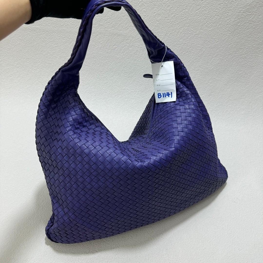 Bottega Veneta Hobo Bag Large Purple Leather 50cm
These are professional photos of the actual bag.
  Experience ultimate luxury with this Bottega Veneta Hobo Bag Large in rich purple leather. Featuring the iconic Intrecciato weave and measuring 51cm