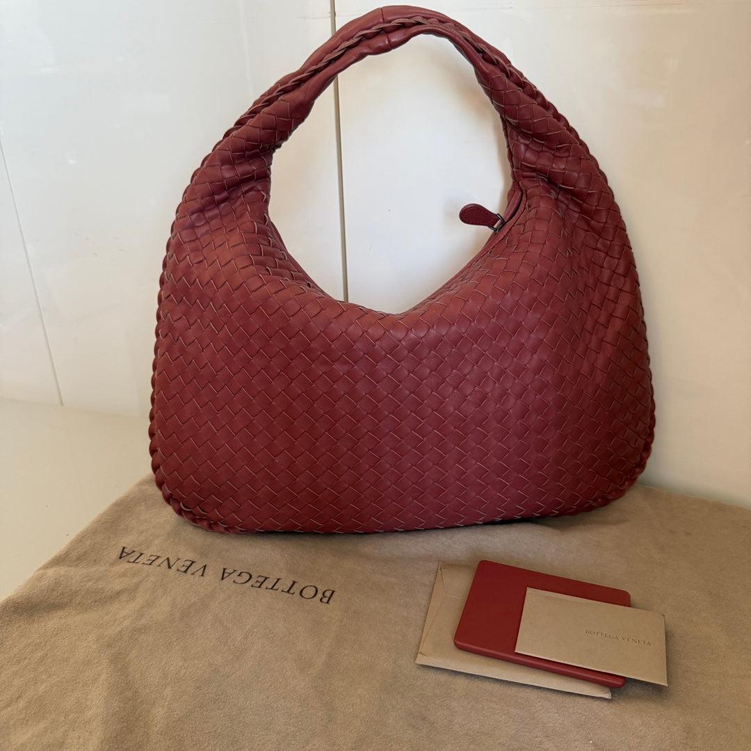 Bottega Veneta Hobo Bag leather Burgundy Medium 40cm
 These are professional photos of the actual bag.
 Experience ultimate luxury with this Bottega Veneta Hobo Bag Large in rich burgundy red lambskin leather. Featuring the iconic Intrecciato weave,