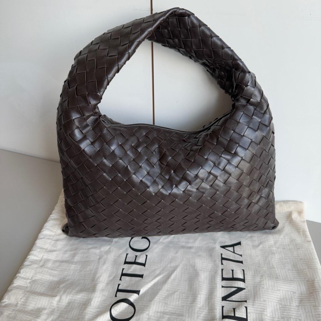 Bottega Veneta Hop Hobo Small Leather Chocolate Brown
  These are professional photos of the actual bag.
  This Bottega Veneta Veneta Bag is an exceptional piece of luxury, crafted from iconic lambskin leather with the instantly recognizable
