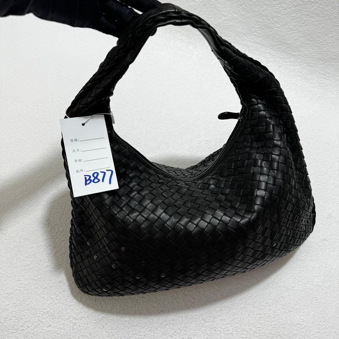 Bottega Veneta Intrecciato Hobo Bag Medium Black leather with Metal Studs 40cm These are professional photos of the actual bag offered by Luxbags. This Bottega Veneta Hobo Bag is an exceptional piece of luxury, crafted from iconic black lambskin
