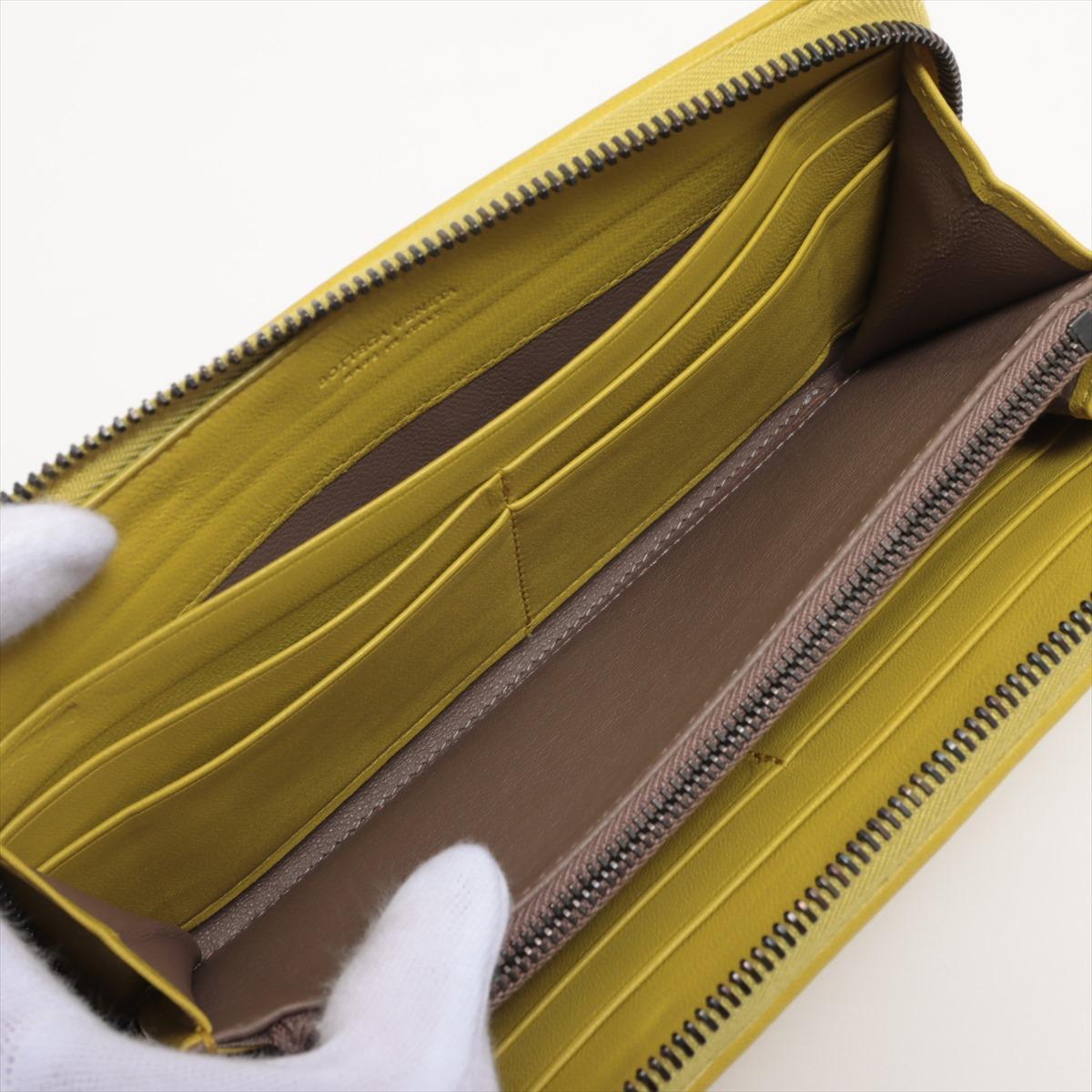 Bottega Veneta Intrecciato Leather Zippy Wallet Yellow Gold For Sale 1