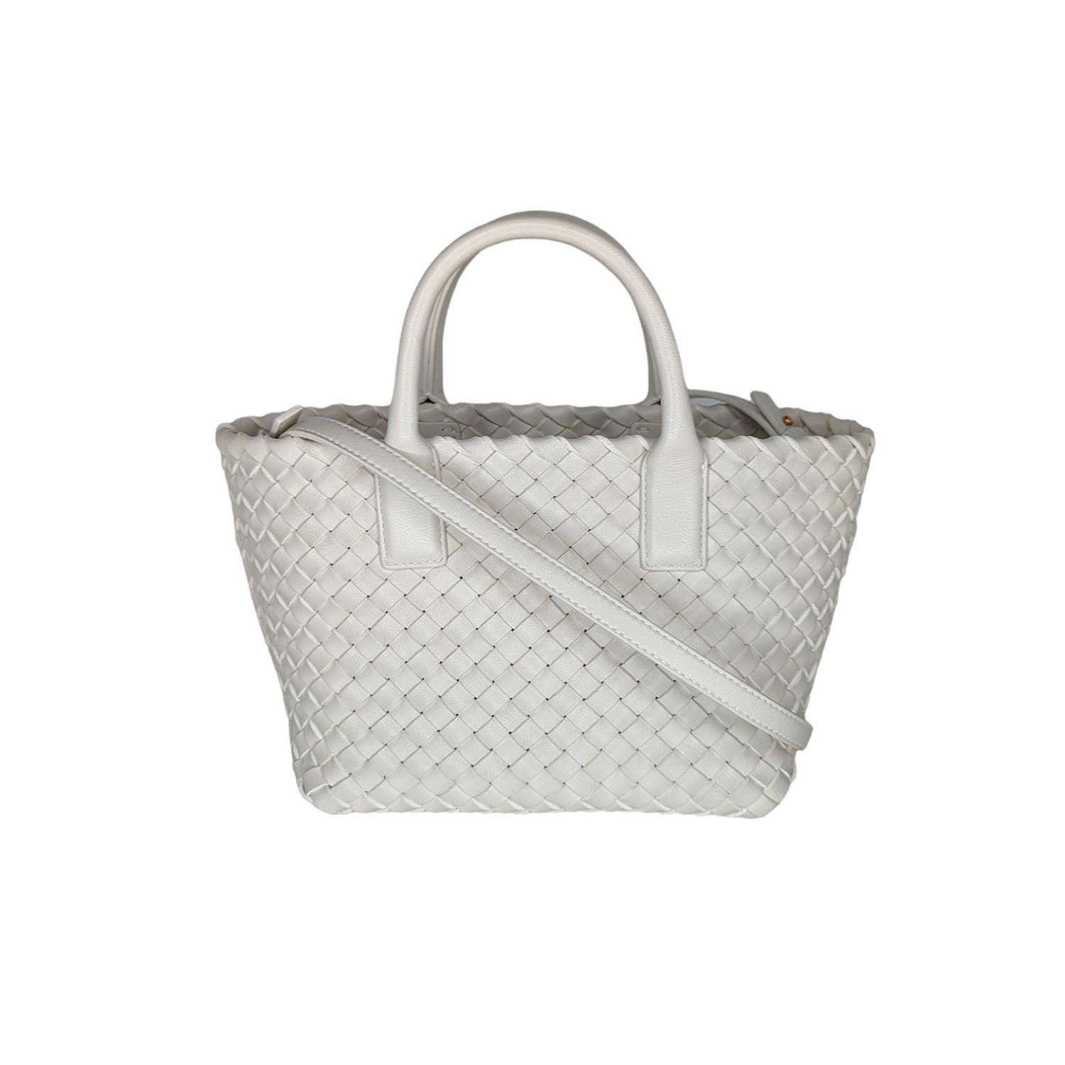 Bottega Veneta tote bag in signature Intrecciato lambskin leather in white. Featuring dual rolled top handles, gold-tone hardware, a removable, adjustable crossbody strap, open top with magnetic closure, spacious interior with a removable leashed