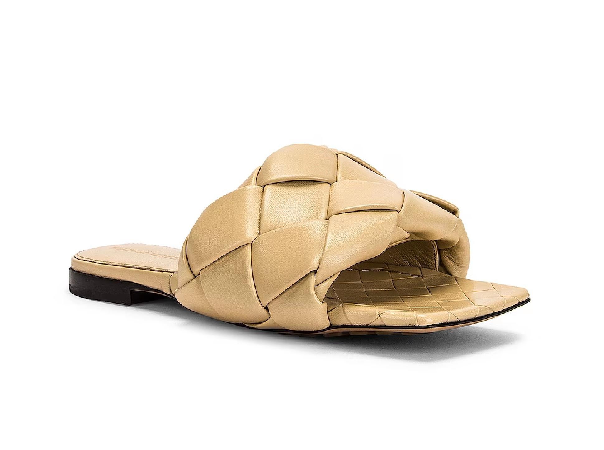 Bottega Veneta's inventive, sophisticated spirit is reflected in the design of these flat BV Lido sandals. A creation that features the brand's famous braided pattern. 
Brand new, never worn, comes with all of original packaging.