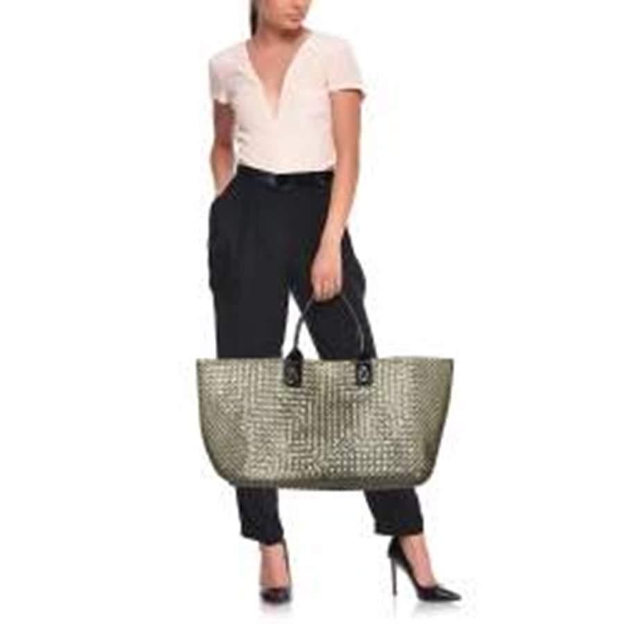 One look at this Cabat tote from Bottega Veneta and you'll know why it is a limited-edition piece. It is high in style and magnificent in appeal. Crafted from PVC and leather in the Intrecciato weave and held by two rolled handles, it has an