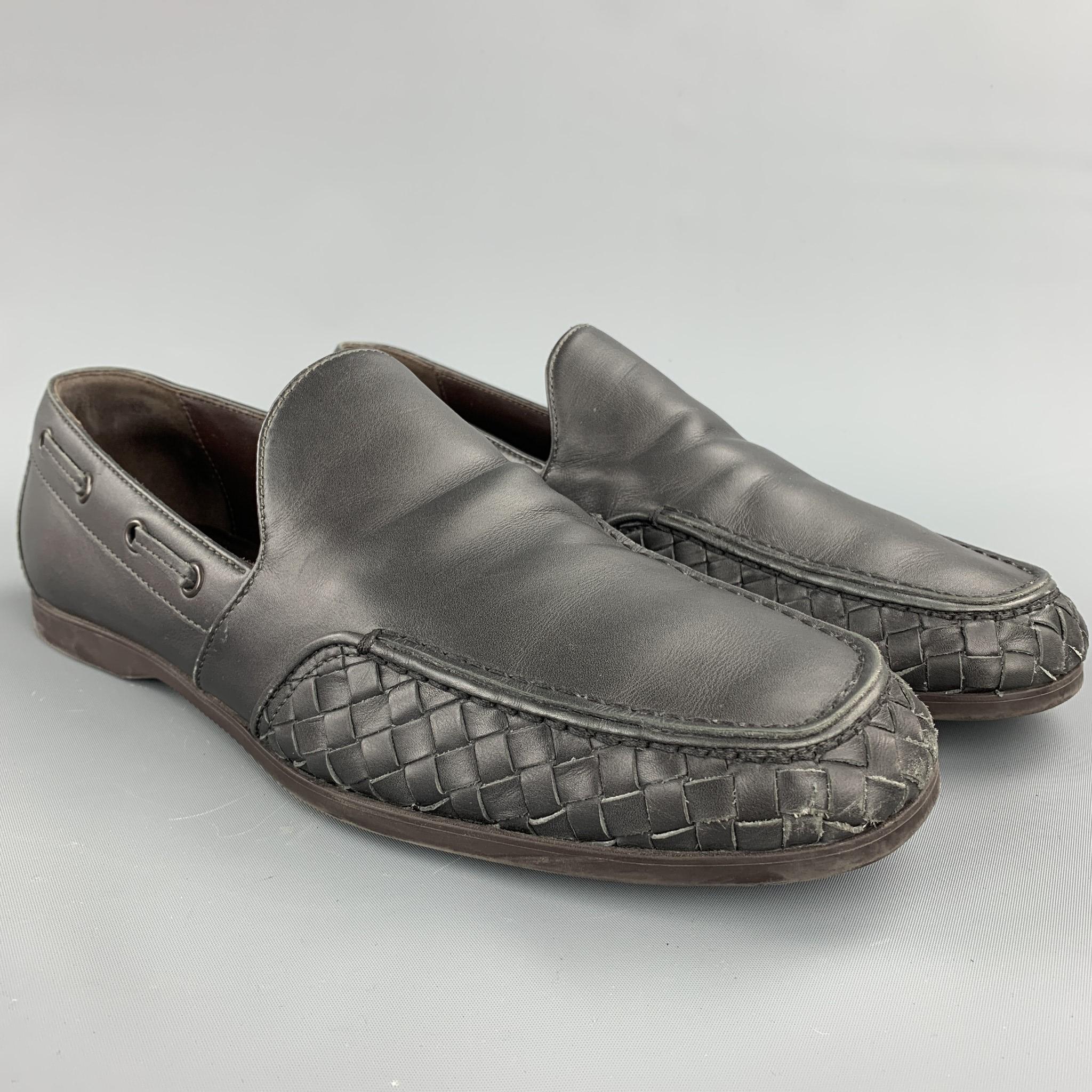 BOTTEGA VENETA loafers comes in a charcoal woven leather featuring a rubber sole. Made in Italy.

Excellent Pre-Owned Condition.
Marked: No size marked

Outsole:

12 in. x 4 in. 