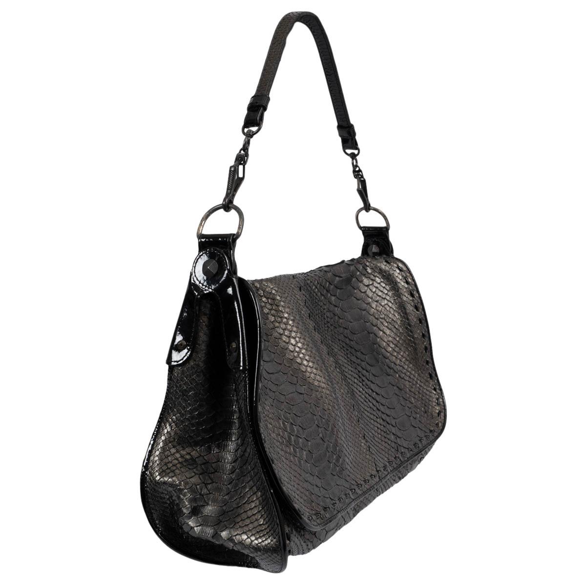 100% authentic Bottega Veneta flap shoulder bag in metallic dark silver python. Features black patent leather trims, gunmetal hardware and different length detachable shoulder straps. Closes with a flap. Lined in beige suede with an open pocket