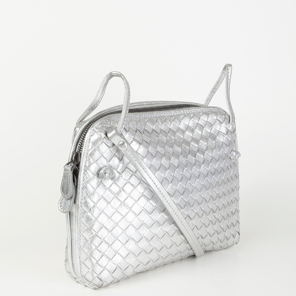 Bottega Veneta 'Nodini Small' crossbody bag in metallic silver Intrecciato. Opens with a zipper on topa nd is lined in dark taupe suede with one zipper pocket against the back. Has some faint wear to the corners and on the beginning of the shoulder